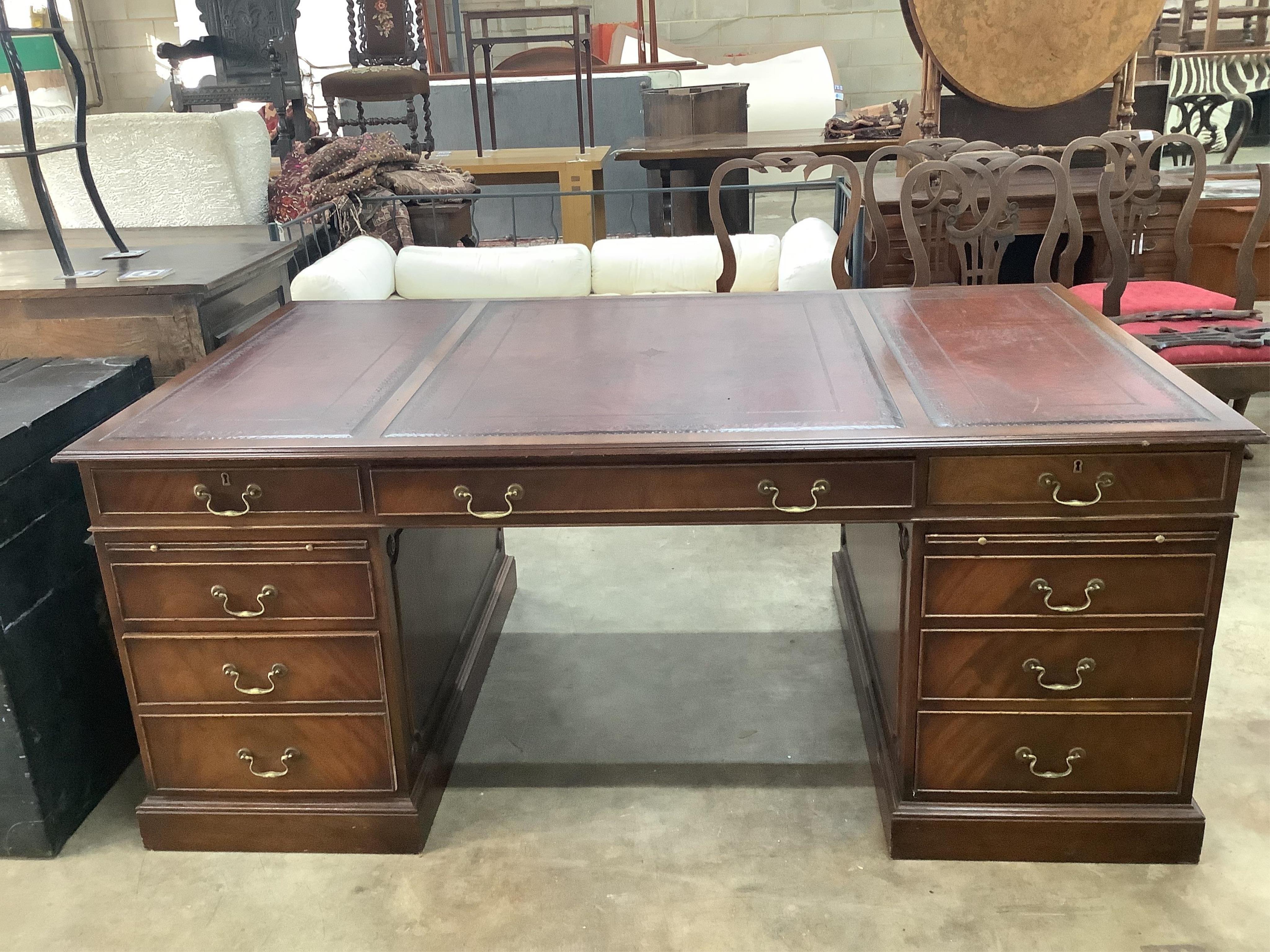A George III style mahogany pedestal desk, width 186cm, depth 106cm, height 76cm. Condition - good